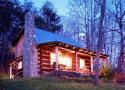Log cabin rental with view of the French Broad River