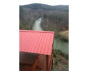 overlook the Nottley river from the hot tub