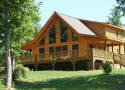 parklike setting with stream, pond, gazebo